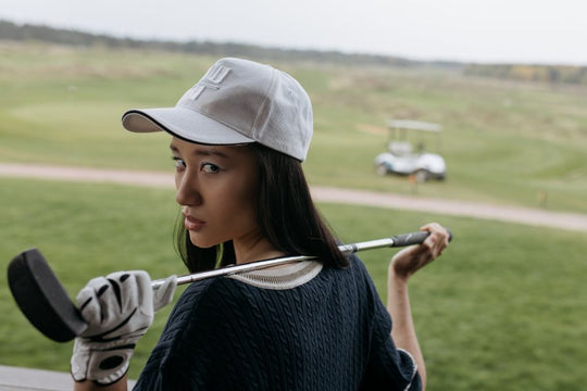 Pexels Images of women holding a golf putter